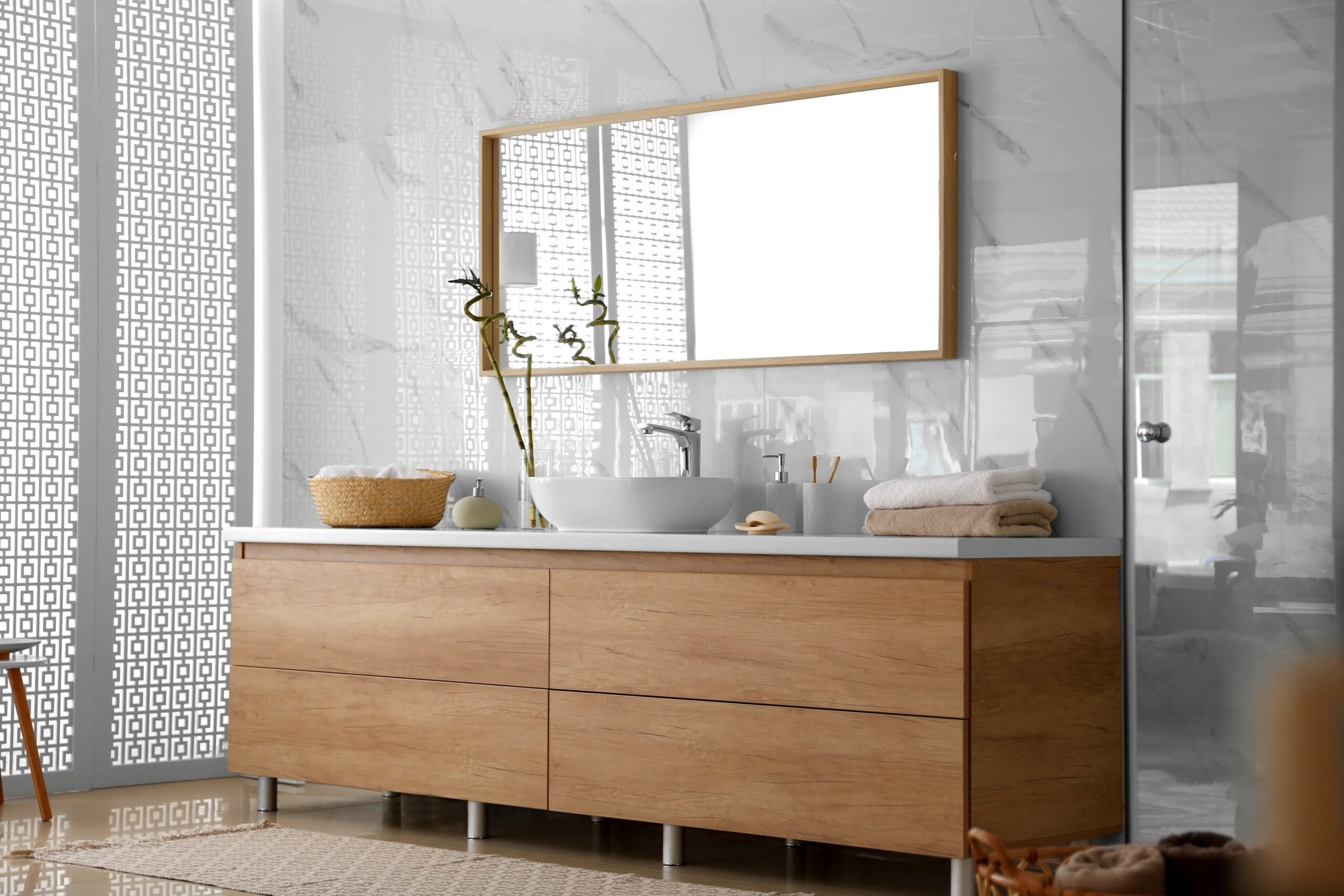 Modern bathroom interior with vessel sink and big mirror