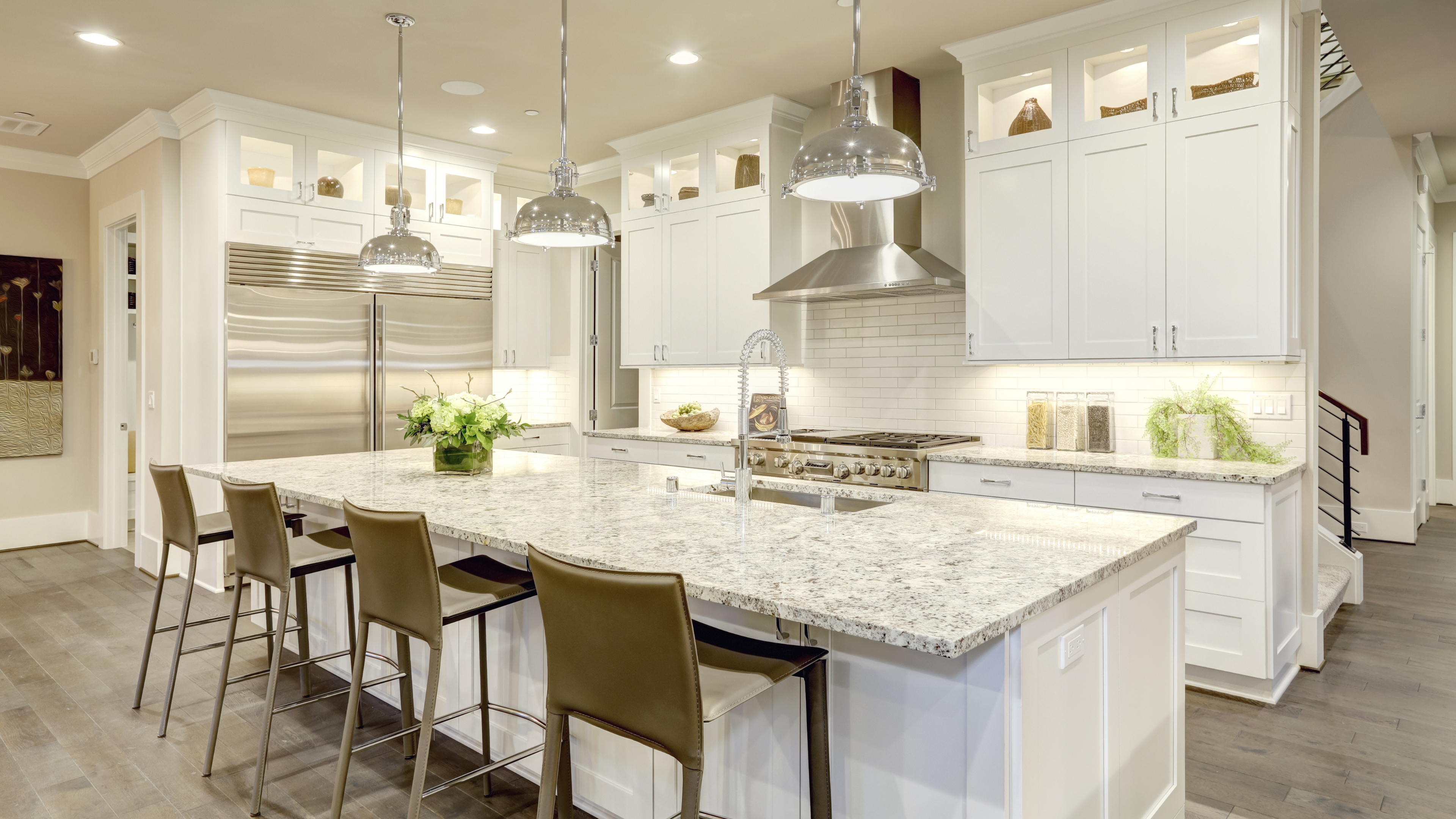 A vibrant kitchen scene featuring various colorful ingredients and utensils arranged neatly on a countertop.