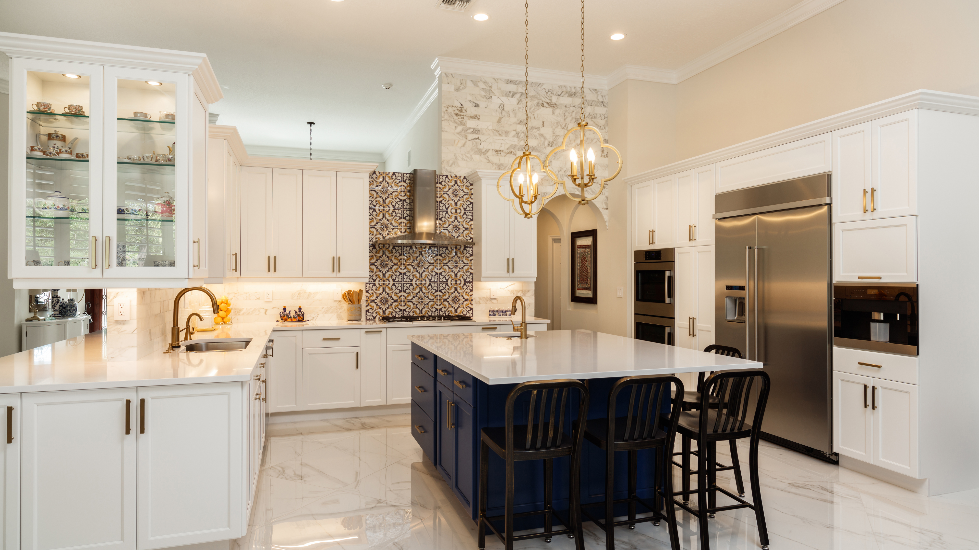 White kitchen with center island and countertops