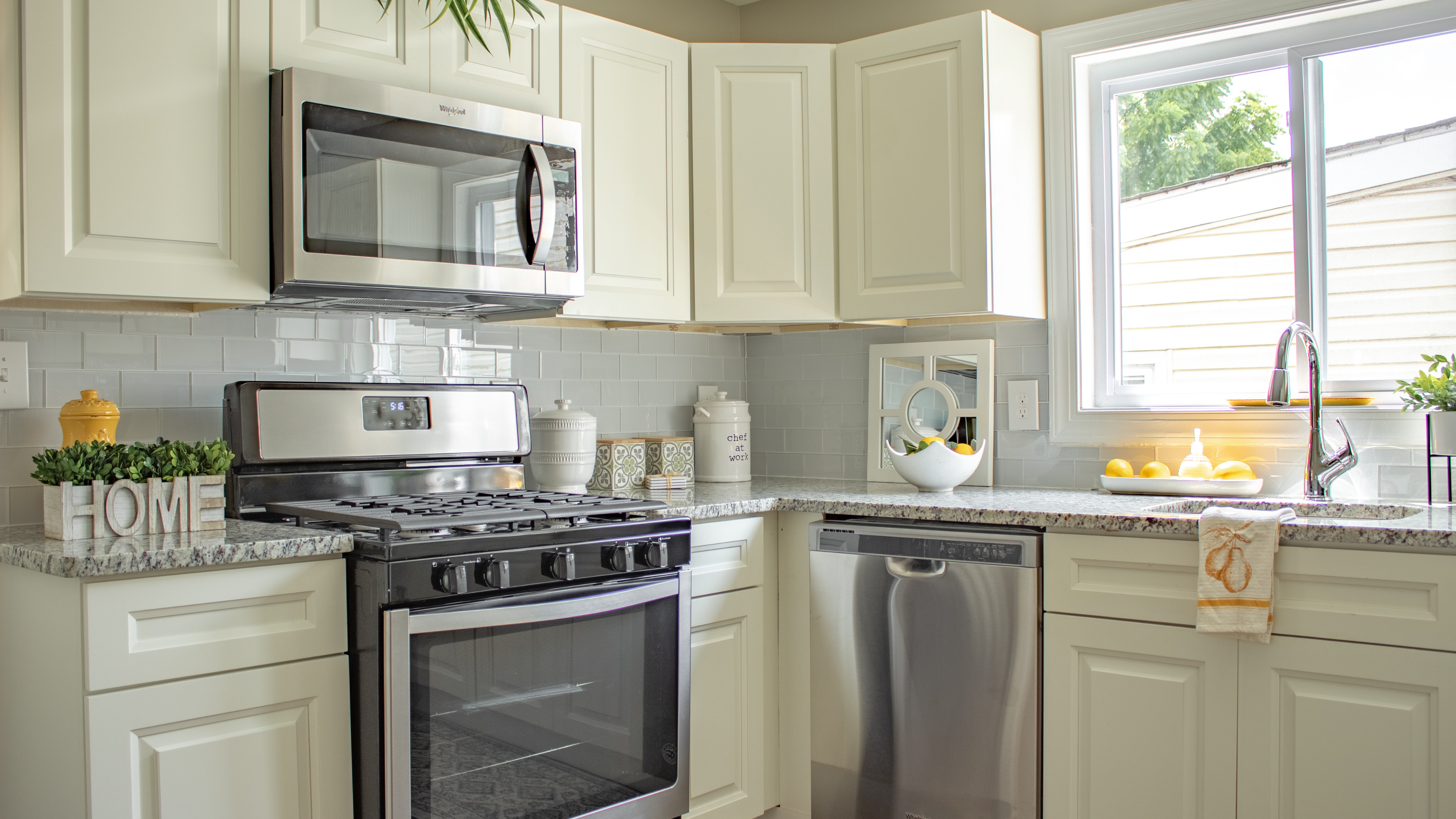 A vibrant kitchen scene featuring fresh ingredients and colorful utensils arranged neatly on a countertop.