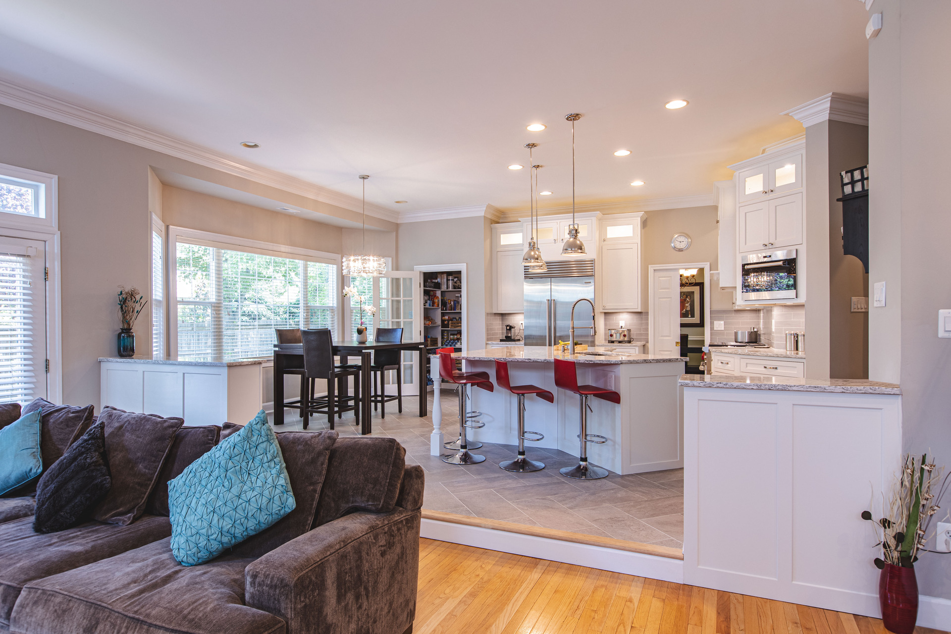 A charming kitchen scene with a table and chairs, ideal for casual dining and socializing.