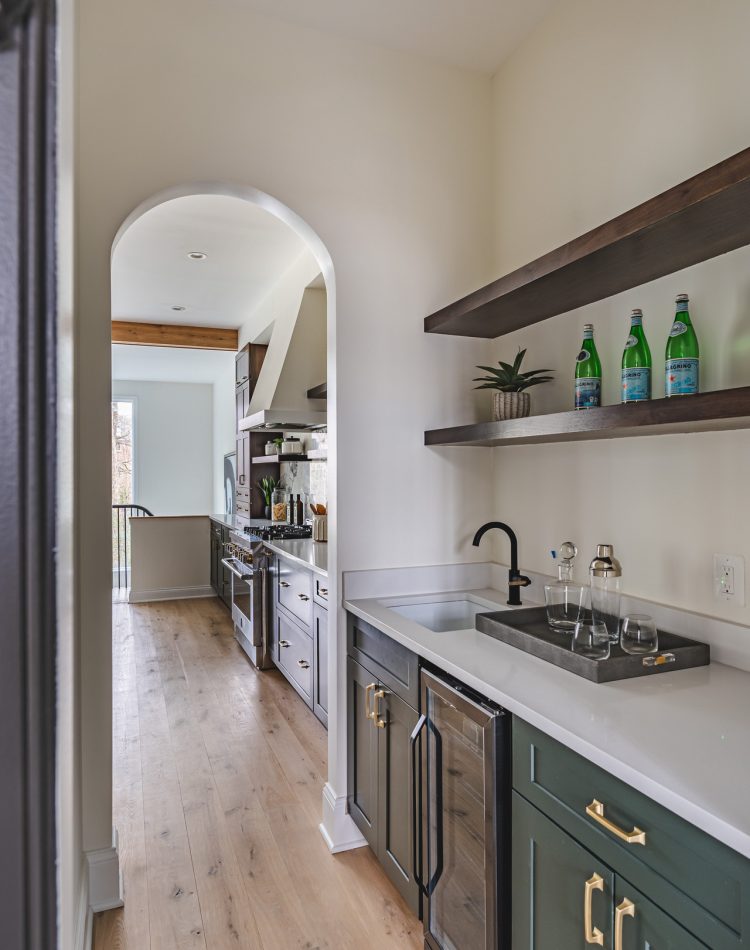 A modern kitchen featuring a sleek sink and a spacious countertop, designed for functionality and style.
